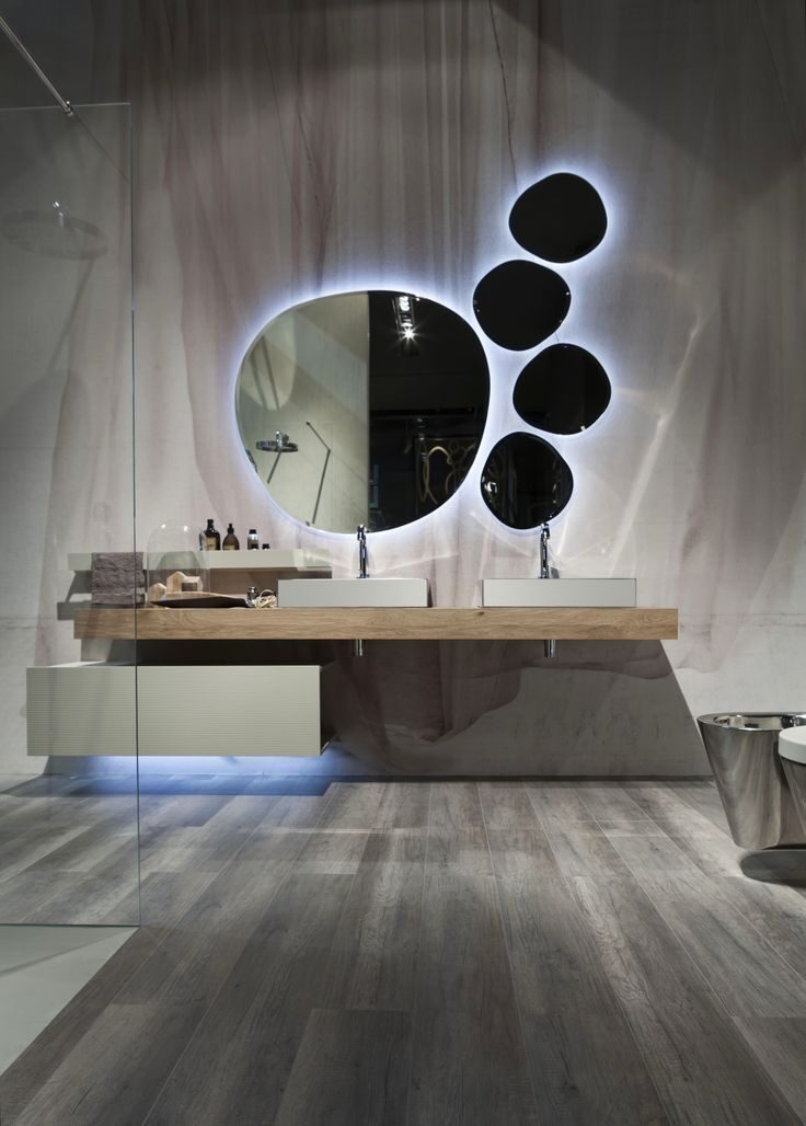 Cloud Black Frame — irregular organic-shaped LED mirror with halo glow, made to order by Lume