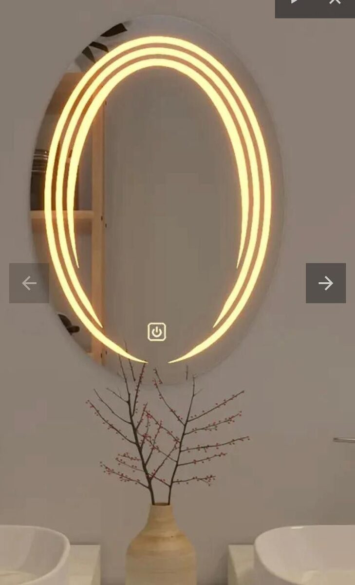 Eclipse Edge — round LED mirror with illuminated frosted ring, made to order by Lume